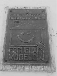 Tarja Escuela Modelo.jpg